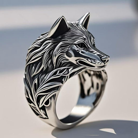 Wolf head ring with detailed design on a neutral background