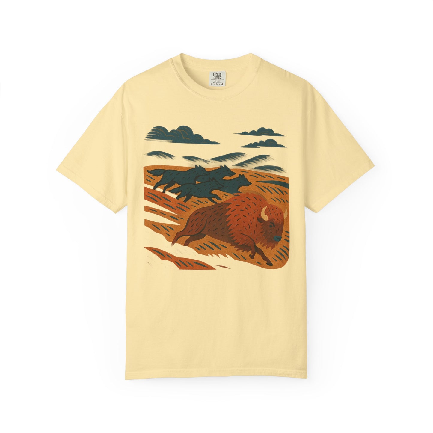 Graphic t-shirt with dynamic wolf pack in motion across grasslands, chasing a bison, printed on soft cotton with relaxed fit and flowing design.