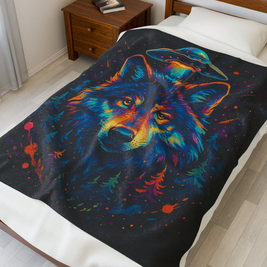 Colorful wolf design blanket on a bed in a bedroom setting
