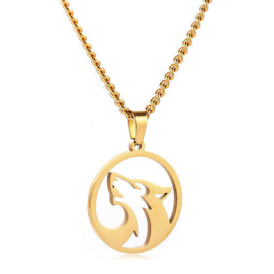 Gold necklace with a wolf pendant on a white background