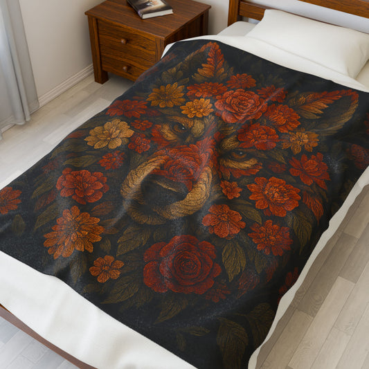 Floral-patterned wolf blanket draped over a bed in a bedroom setting