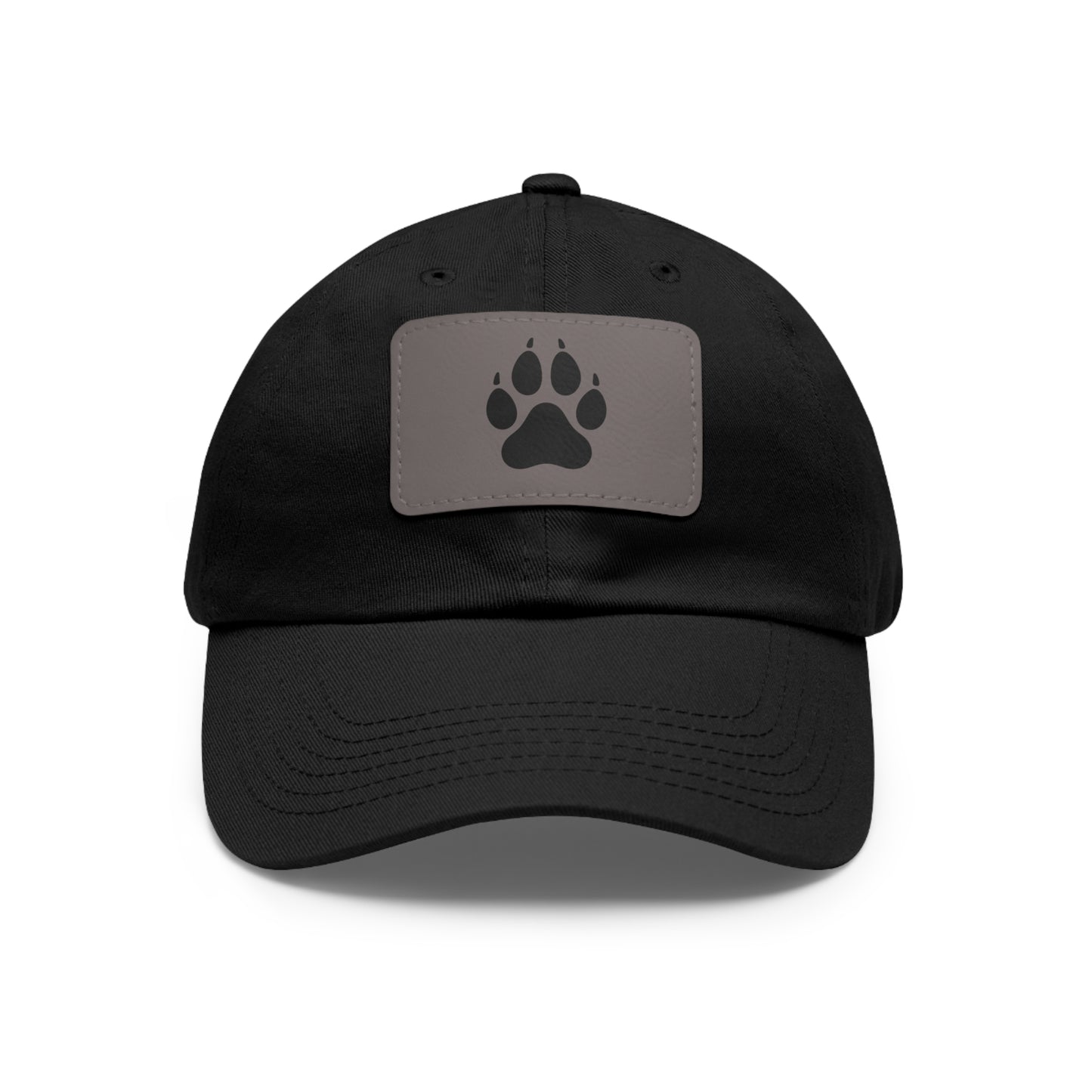 Black cap with a gray patch featuring a wolf paw print on a white background