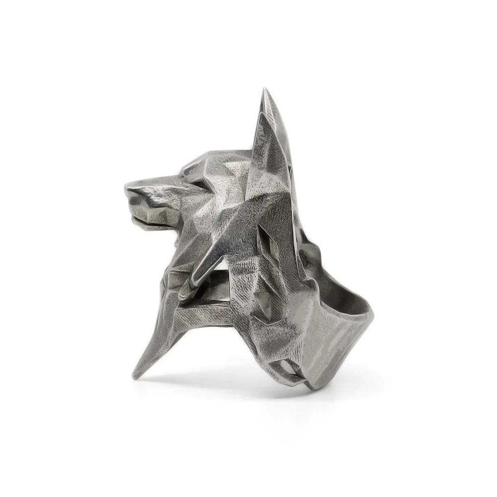 Silver geometric ring on a white background