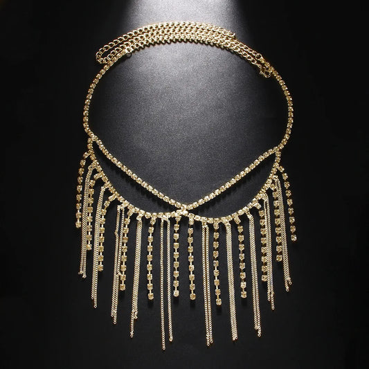 Gold fringe face mask on a black background