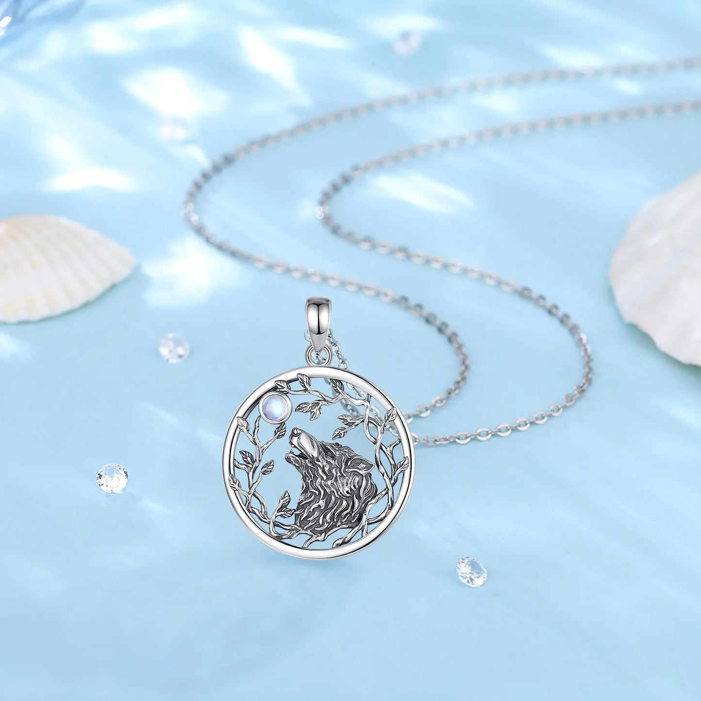 Silver necklace with a wolf pendant on a light blue background