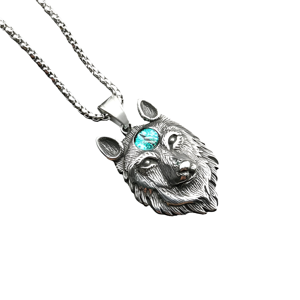 Silver wolf head necklace with a turquoise gemstone on a white background