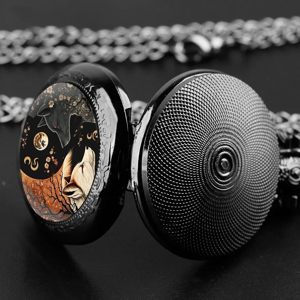 Close-up of a decorative pocket watch with intricate design on a dark background
