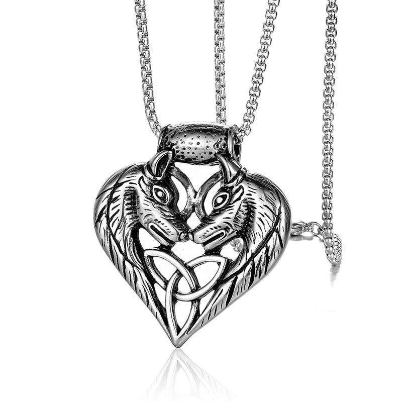 Silver wolf head pendant necklace on a white background