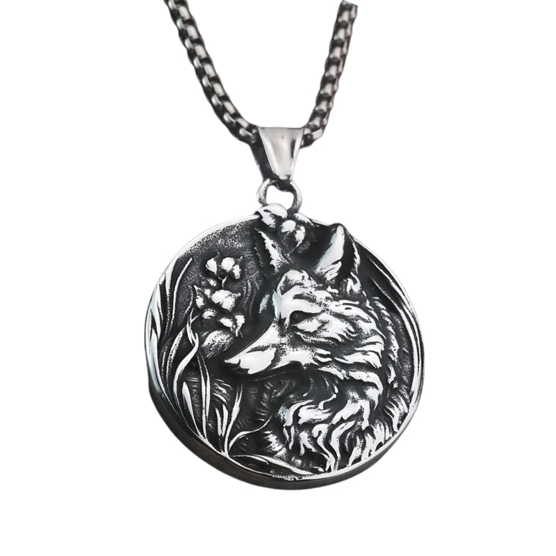 Silver necklace with a wolf pendant on a white background