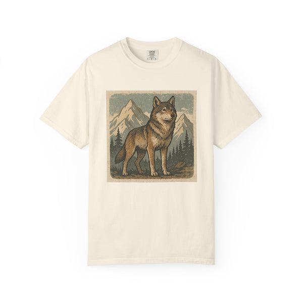 Beige t-shirt with a graphic of a wolf and mountains on a white background