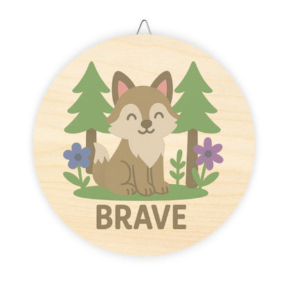 Wooden plaque with a fox illustration and the word 'Brave' on a white background