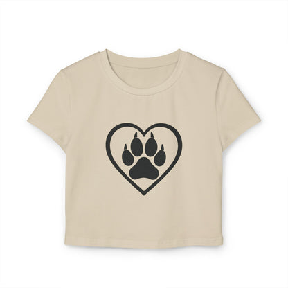 Beige t-shirt with a black heart and paw print design on a white background