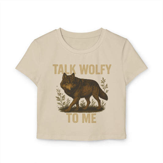Beige t-shirt with a wolf graphic and text that says "Talk Wolfy To Me"