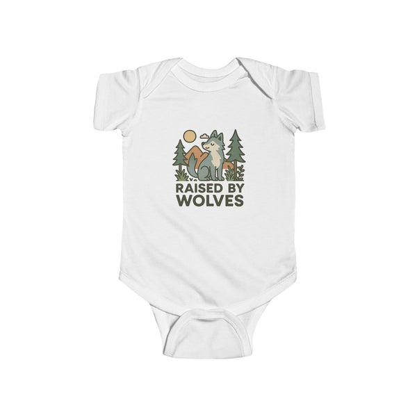 White baby onesie with 'Raised by Wolves' graphic design on a white background