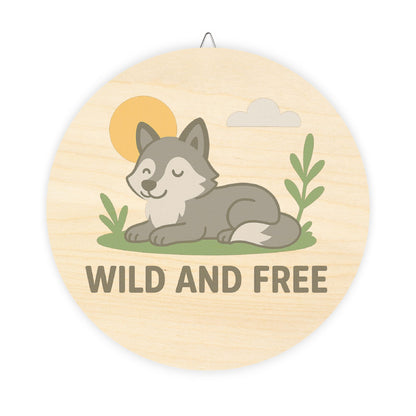 Round wooden sign with a wolf illustration and 'Wild and Free' text on a white background