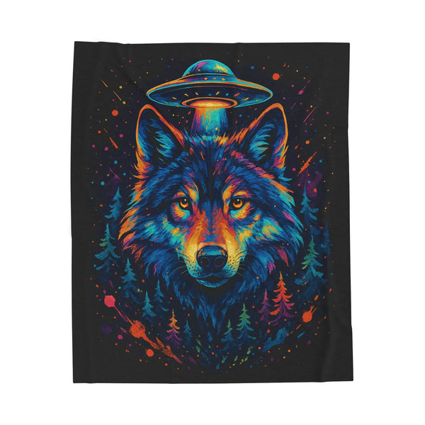 Colorful wolf design with a UFO above its head on a black blanket