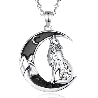 Silver necklace with a wolf and crescent moon design on a white background