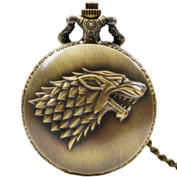 Bronze pocket watch with a wolf emblem on a white background