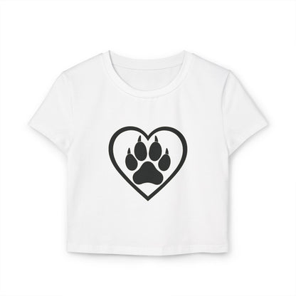 White t-shirt with black heart and paw print design on a white. Organic cotton baby tee with wolf-inspired design, printed on a slim-fit, eco-friendly shirt.