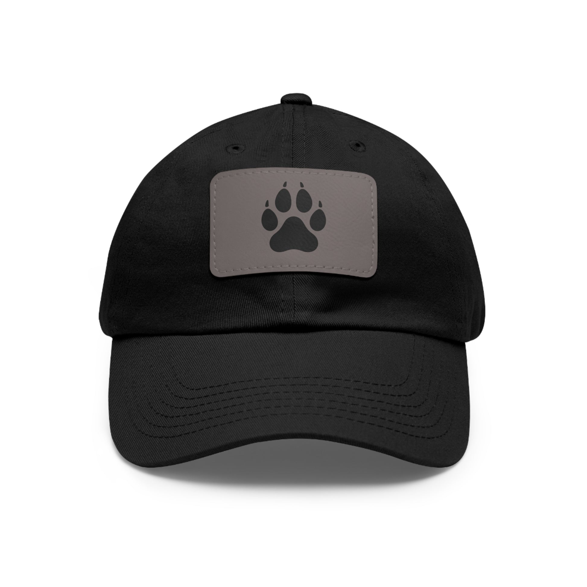 Black cap with a gray patch featuring a wolf paw print on a white background