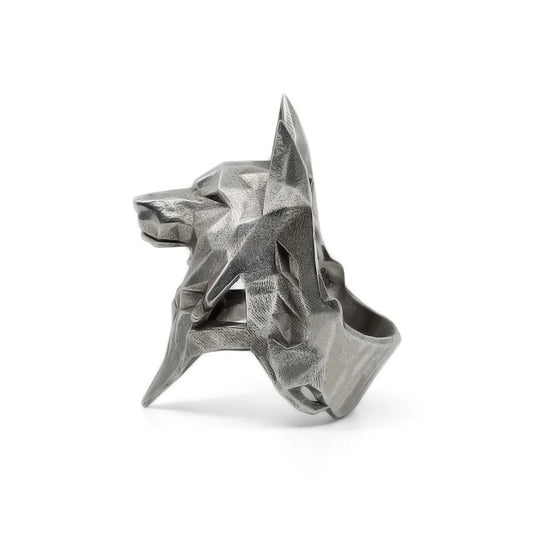 Silver geometric ring on a white background