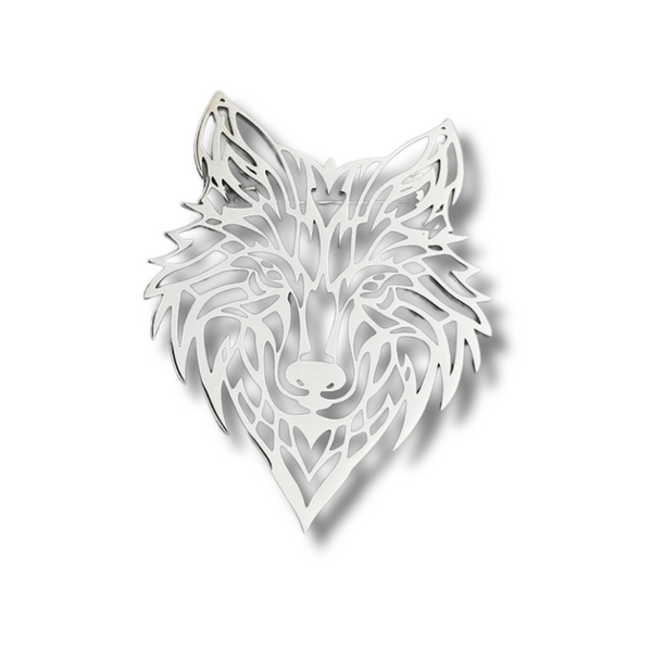 Silver wolf head design on a brooch / pin on a white background