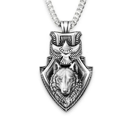 Silver necklace with a wolf head and eagle design pendant on a white background