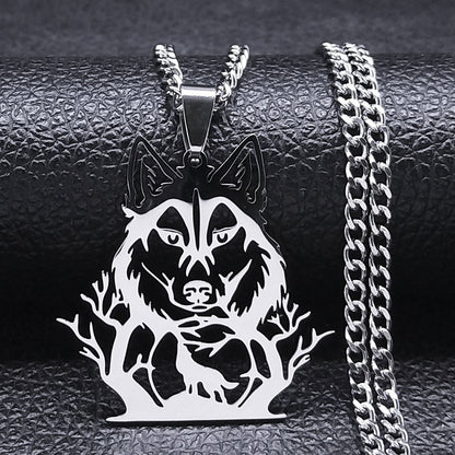 Wolf pendant necklace on a textured black surface