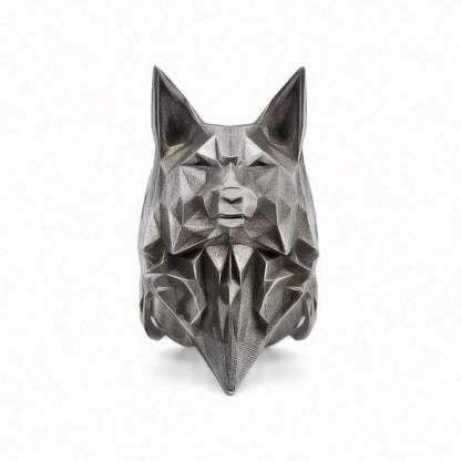 Geometric wolf head sculpture on a white background