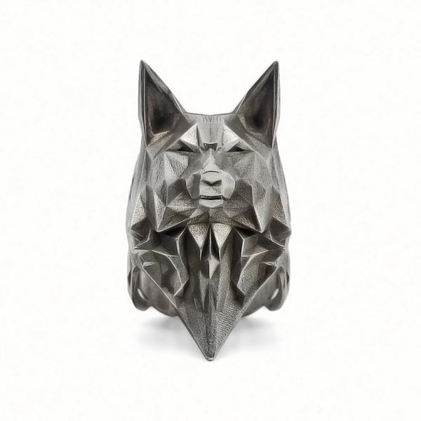 Geometric wolf head sculpture on a white background