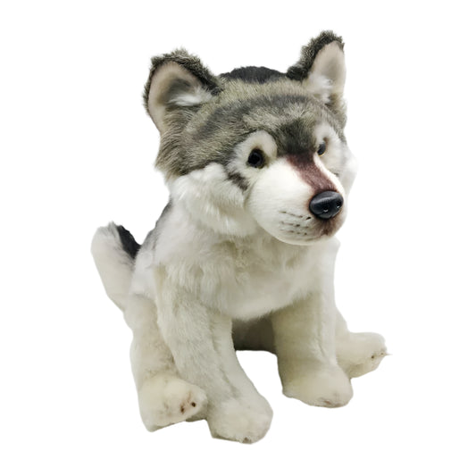 Plush toy wolf sitting on a white background