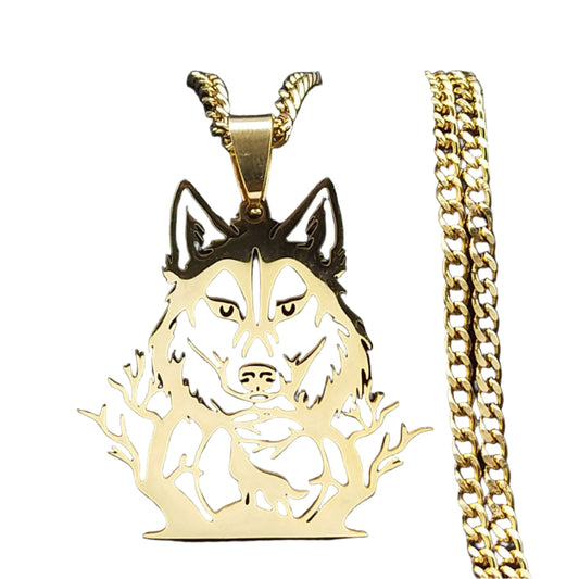 Gold wolf pendant with chain on a white background