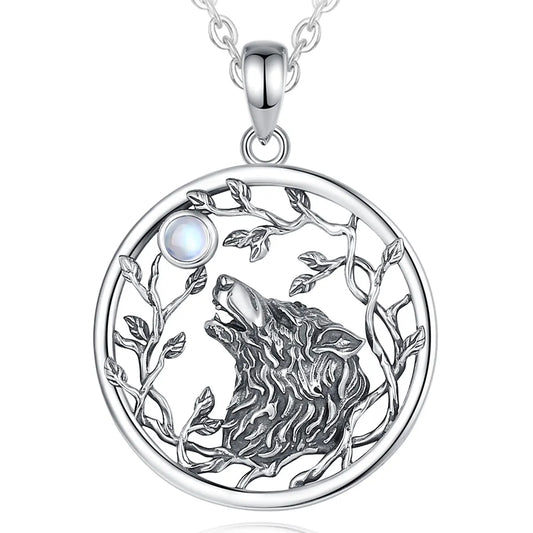 Silver necklace with a wolf design and moonstone on a white background