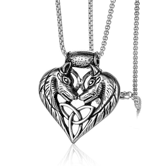 Silver wolf head pendant necklace on a white background