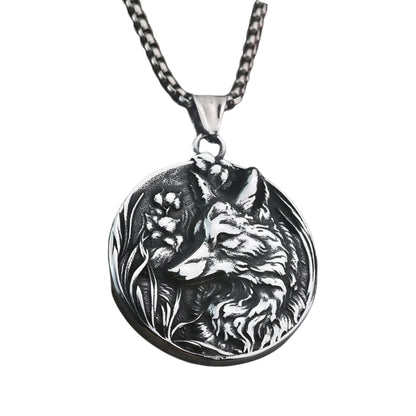 Silver necklace with a wolf pendant on a white background