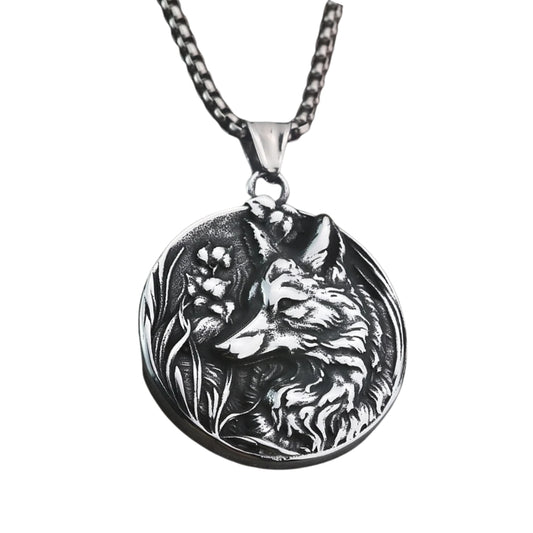 Silver necklace with a wolf pendant on a white background