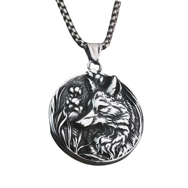 Silver necklace with a wolf pendant on a white background